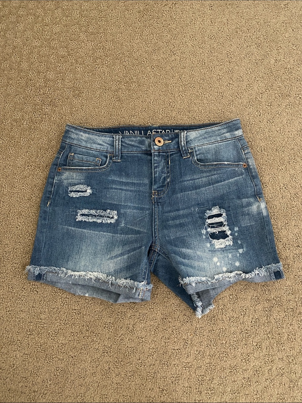 Junior’s Blue Distressed Denim Shorts with Frayed Hem